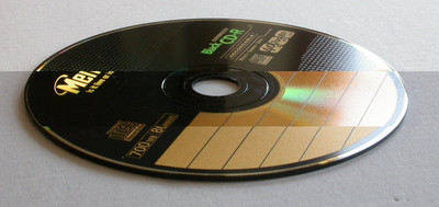 Composite of three photographs, showing differences in label.